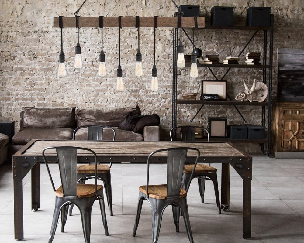 Rustic linear chandelier above a dining table.